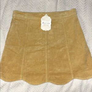 NWT Altard State mustard mini skirt. Scalloped hem.